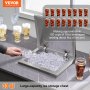 VEVOR ice chest, 30 qt large-capacity, filled with ice cubes, surrounded by beverages on a countertop.