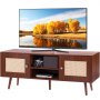 modern VEVOR rattan tv stand with storage shelves and decorative yellow tree landscape on tv screen.