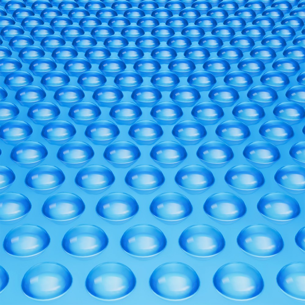 blue bubble texture pattern on VEVOR solar pool cover with circular raised shapes.