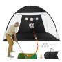 golfer practicing with VEVOR golf net set, including mat, tee, balls, stakes, and carrying bag.