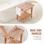 VEVOR shower bench with dual side handles, towel hanging, and sturdy wooden build next to a bathtub.