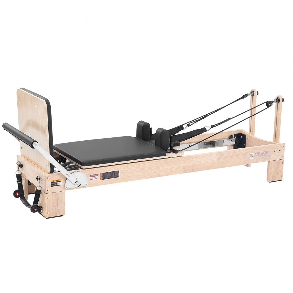 Reformer VEVOR Pilates wykonany z drewna kauczukowego, 181 kg, 2400 x 680 x 915 mm. Idealny do domowych siłowni i studiów, z cichym mechanizmem jezdnym, regulowanym zagłówkiem, skrzynią do pilatesu, trampoliną i paskami na stopy.