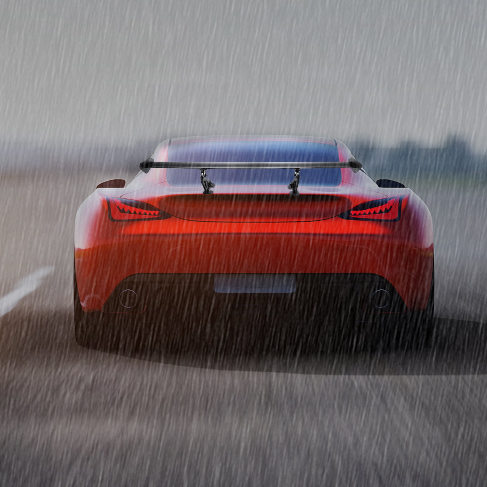 red sports car with VEVOR gt wing car spoiler driving in the rain.