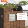 VEVOR outdoor kitchen drawers in brick island with utensils and grill nearby.