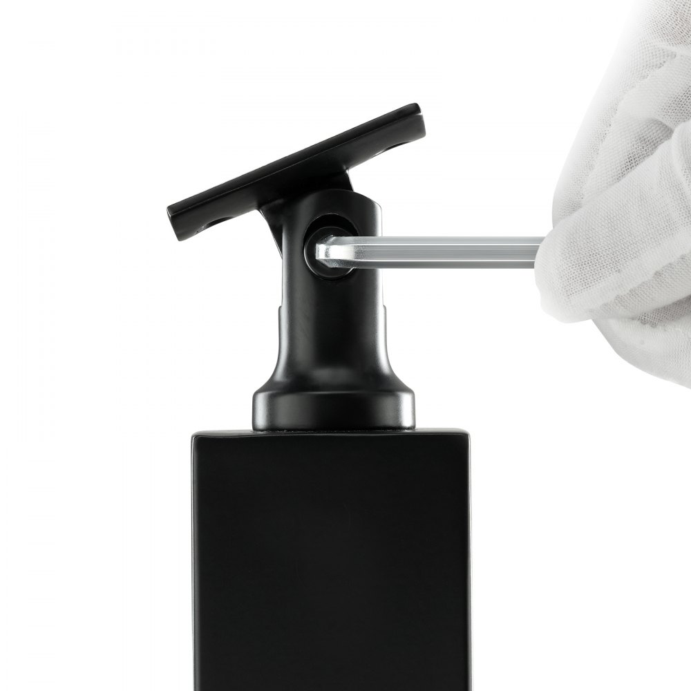gloved hand tightening a screw on a black VEVOR cable railing post with a hex key.