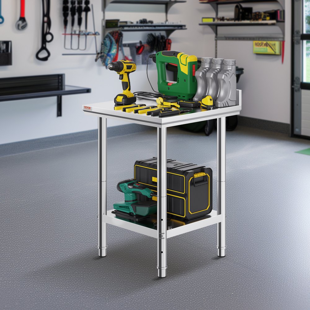 VEVOR stainless steel work table in a garage with tools and storage boxes.