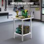 VEVOR stainless steel work table with multiple tools in a tidy garage setup.