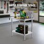 Table de préparation en acier inoxydable VEVOR avec outils et rangement dans un atelier de garage organisé.