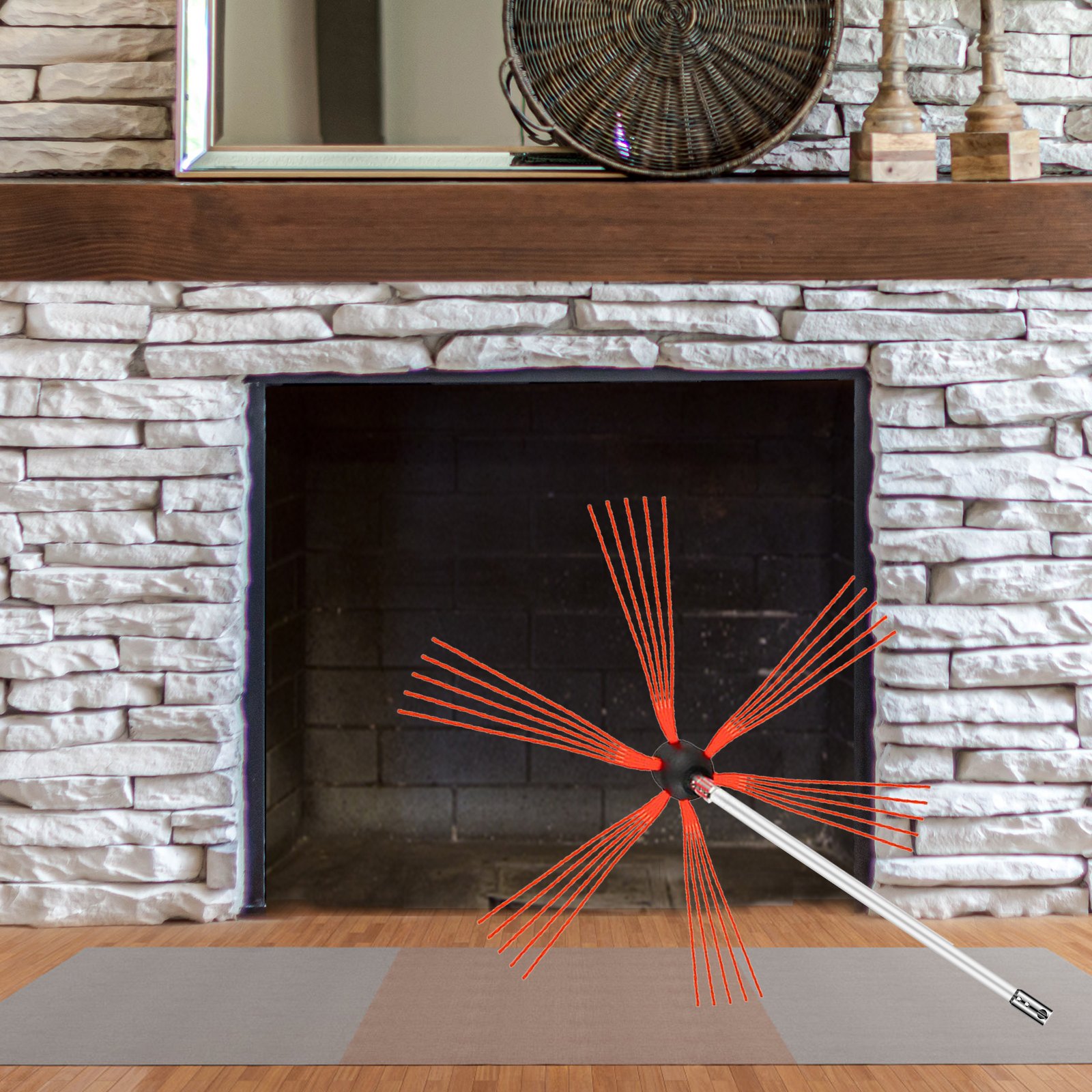 VEVOR chimney sweep kit in front of a brick fireplace and wooden mantel.