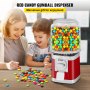 VEVOR gumball machine dispensing colorful candies on a table with people in the background.