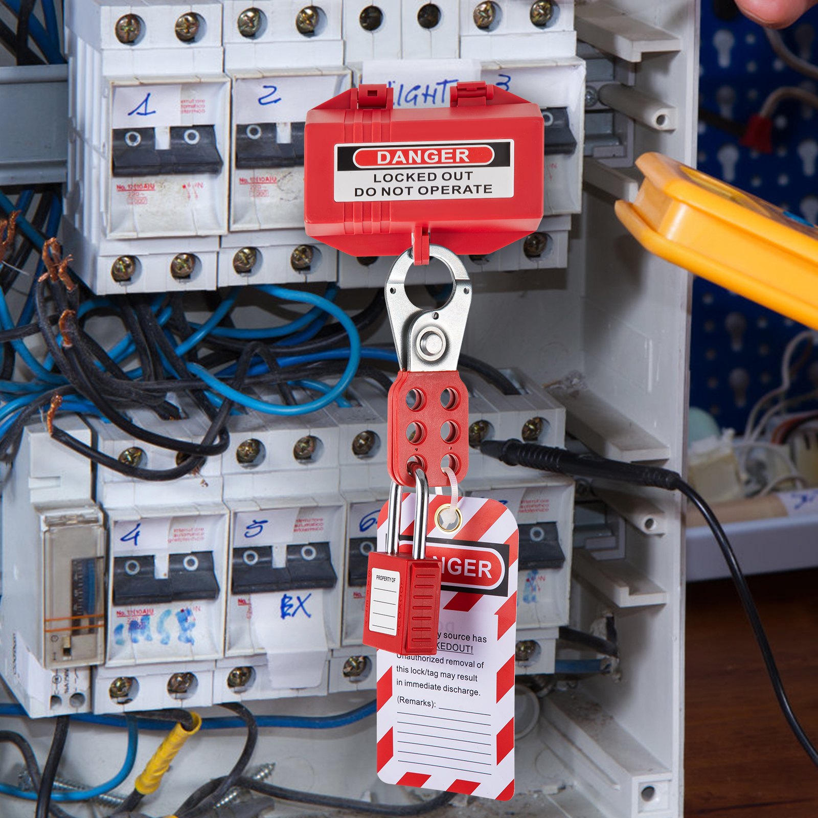 electrical panel secured with VEVOR lockout tagout kits for safety, showing warning tags and padlocks.