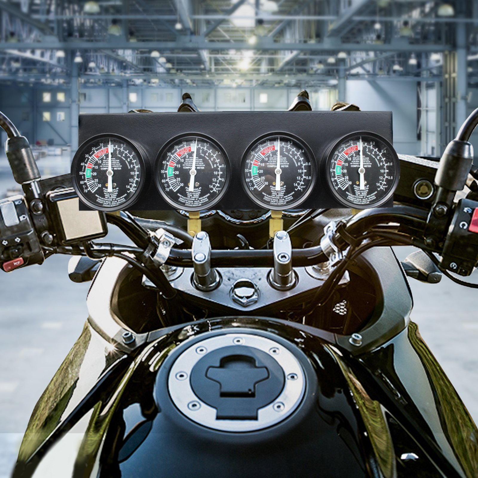 VEVOR carburetor synchronizer on a motorcycle in an industrial workshop setting.