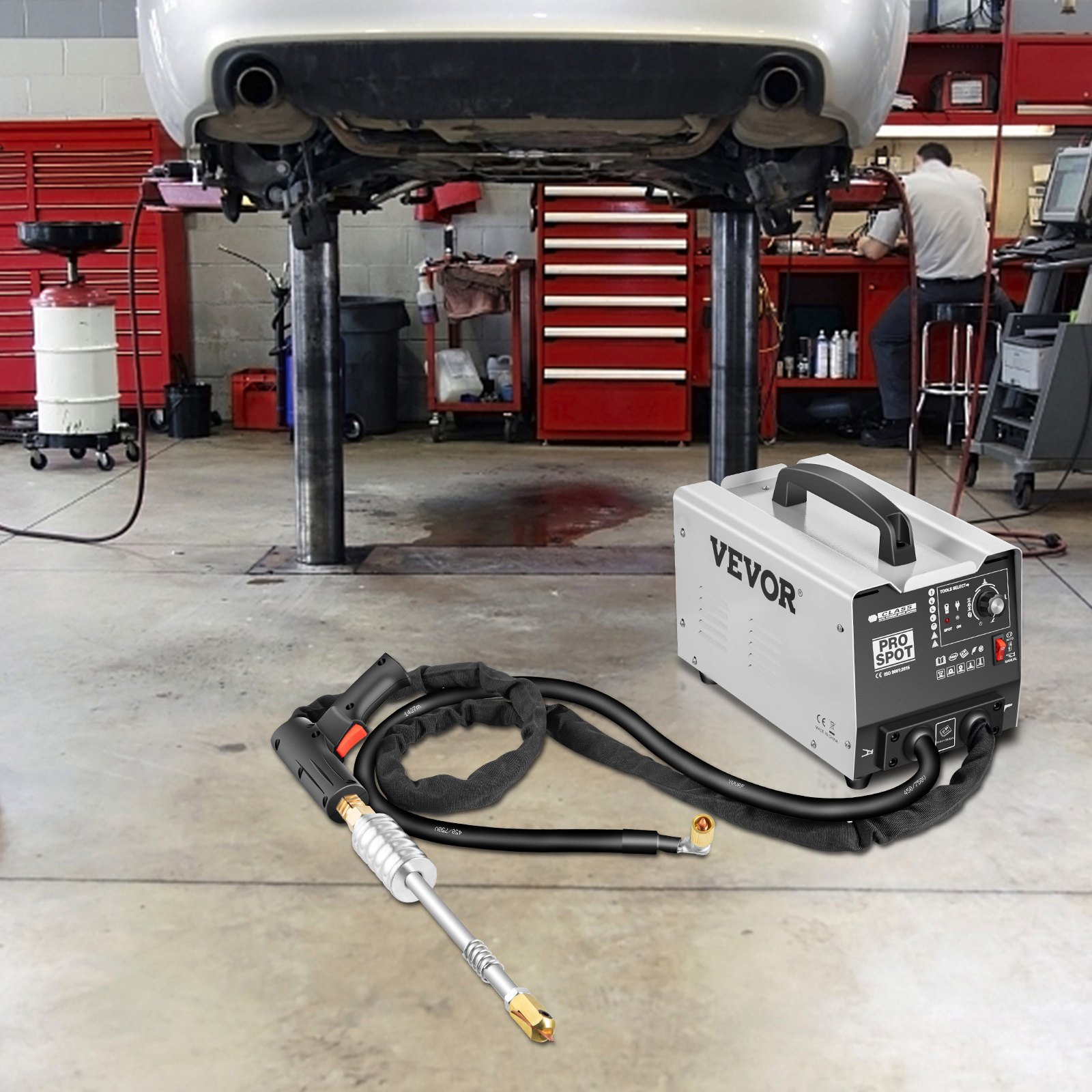 VEVOR dent puller displayed in an auto repair shop with car lift and red tool cabinets.