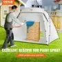 man using VEVOR portable paint booth to spray paint a wooden dresser in a yard setting.