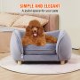 cute brown poodle sitting on a comfy gray VEVOR pet sofa in a stylish, cozy room with pastel decor.