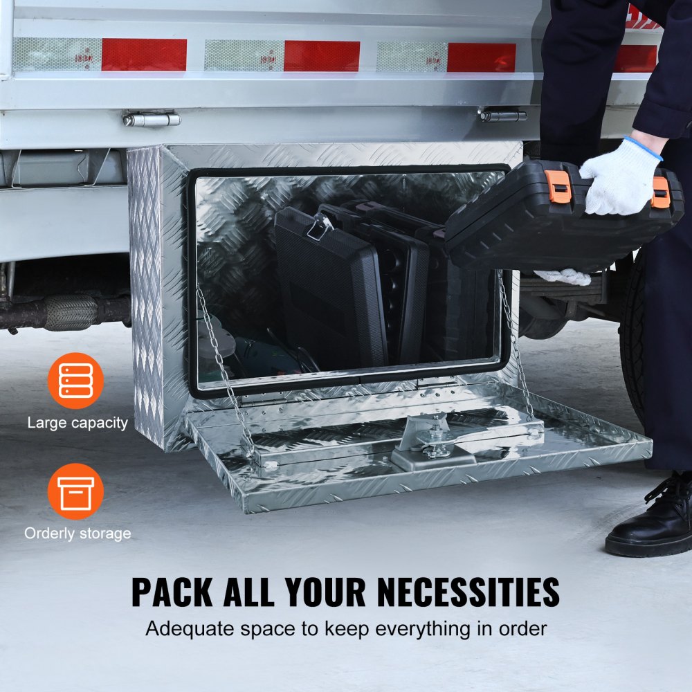 user accessing VEVOR underbody truck box for tool storage under truck.