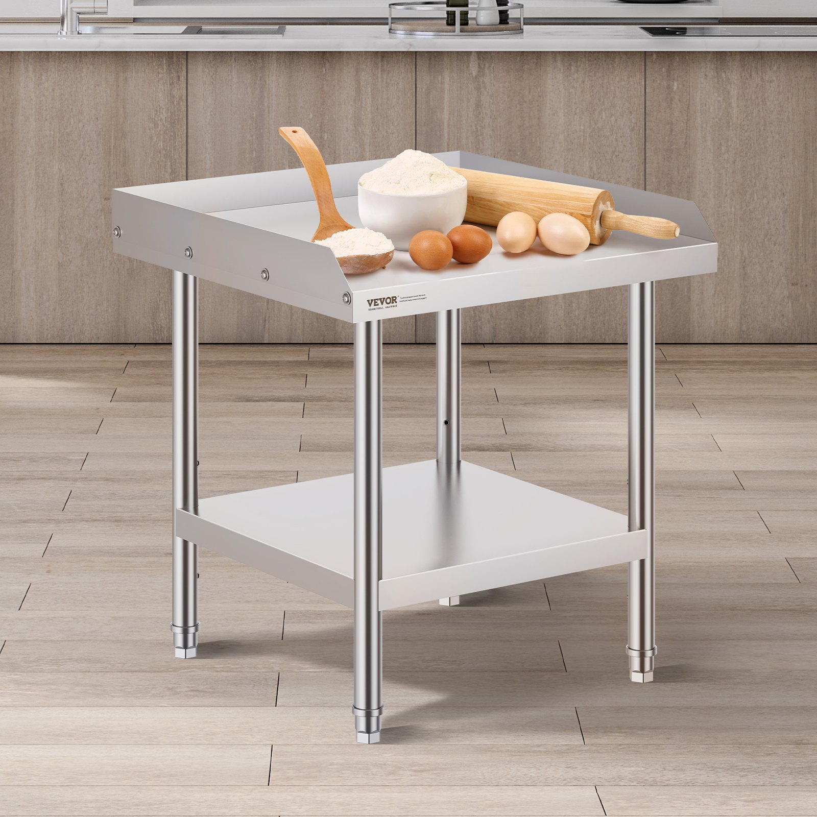 VEVOR stainless steel work table with baking ingredients in a modern kitchen.