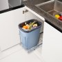 VEVOR pull-out trash can under kitchen counter, filled with waste, adjacent to a sink.
