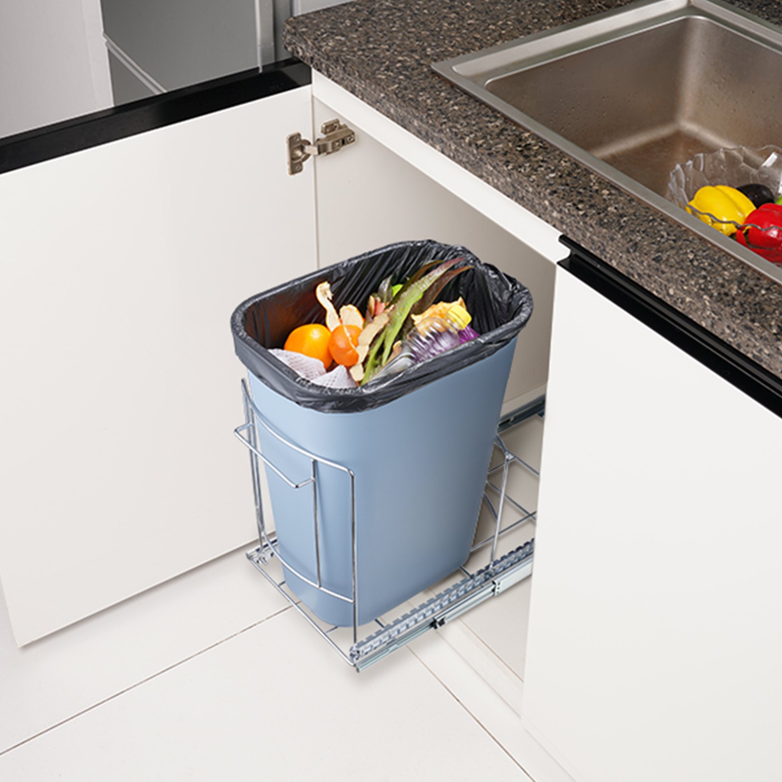 VEVOR pull-out trash can under kitchen counter, filled with waste, adjacent to a sink.