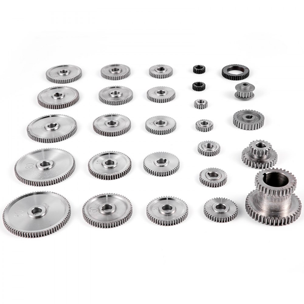 various sizes of VEVOR mini lathe gears arranged on a white surface.