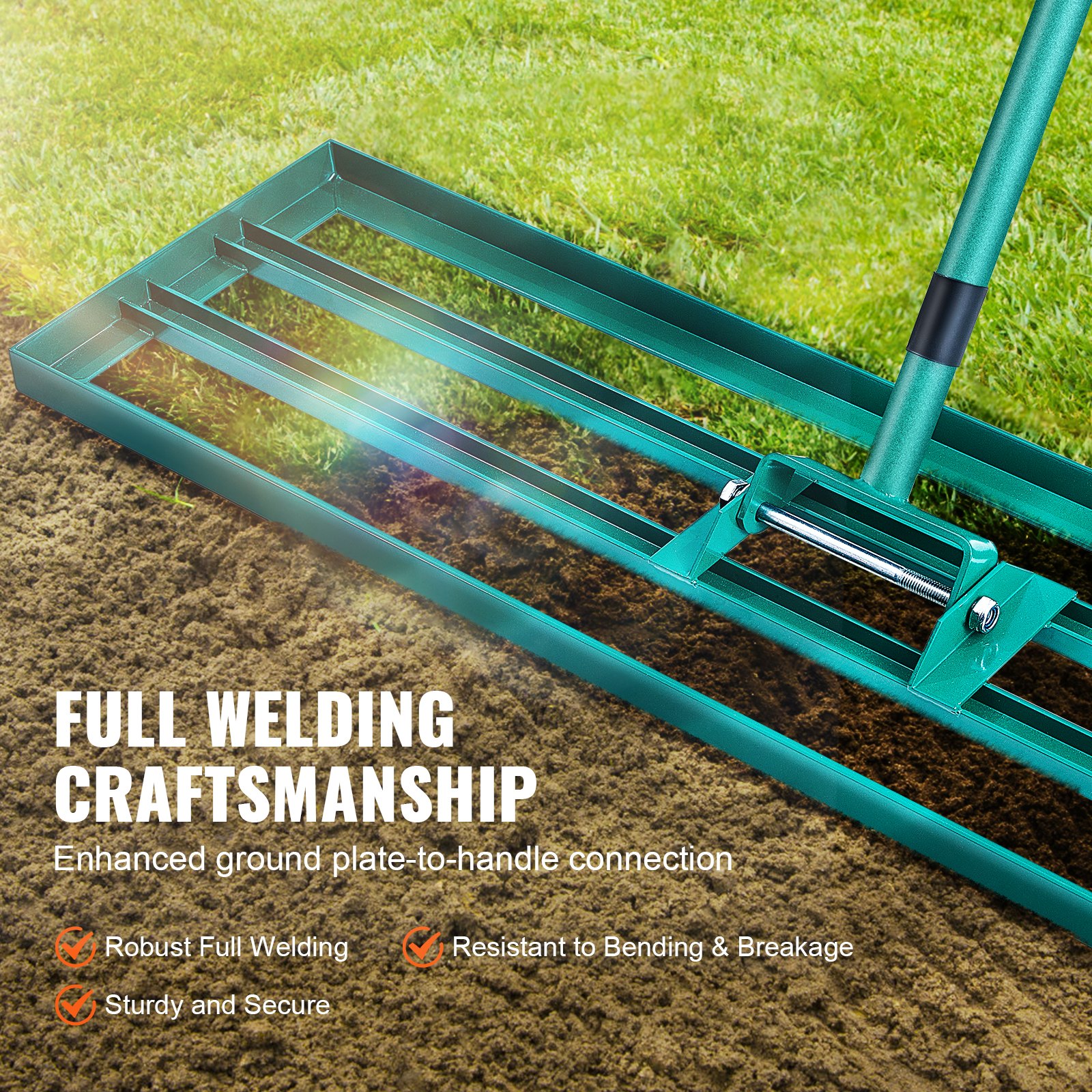 VEVOR lawn leveling rake with sturdy full welding craftsmanship lies on the grass and soil.