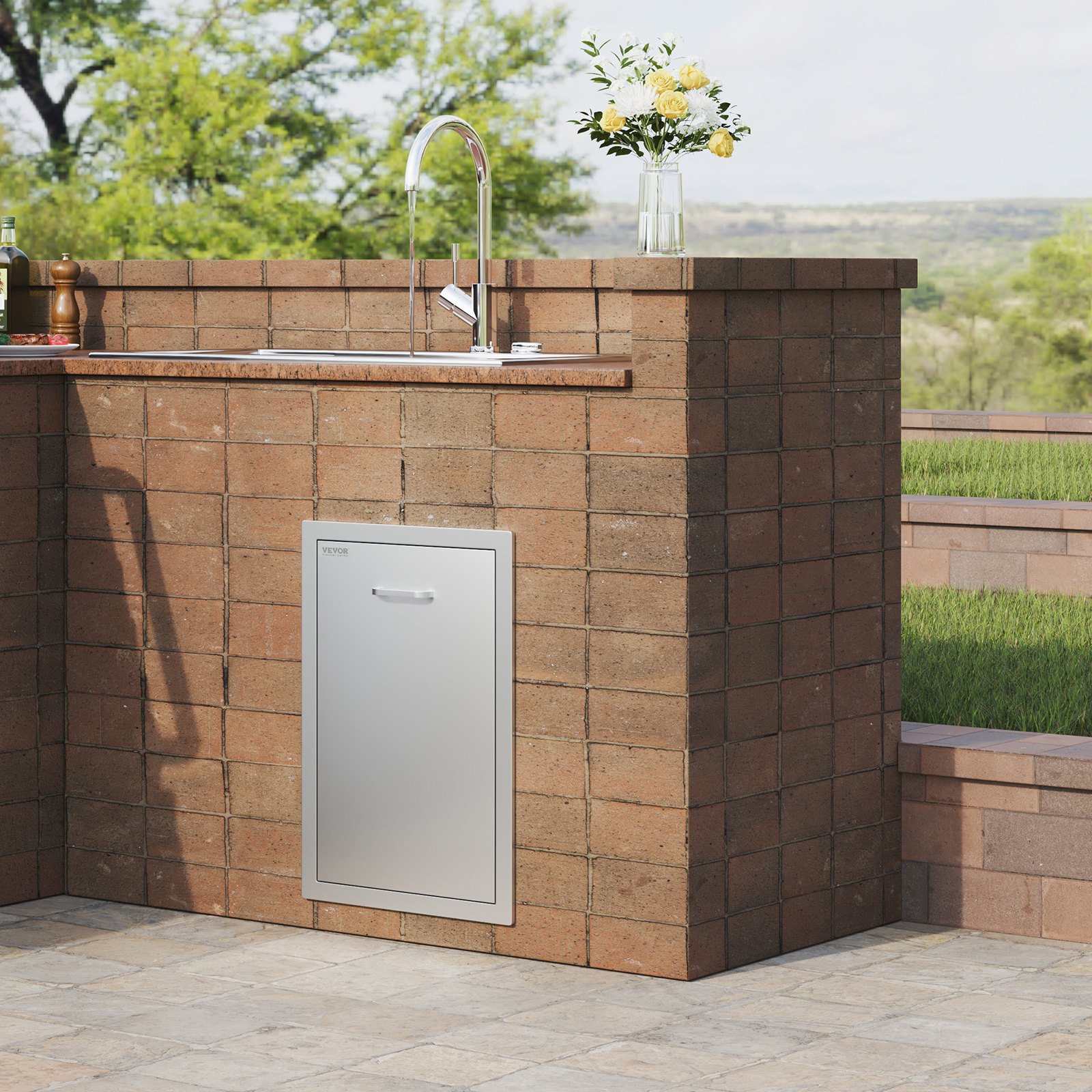 brick outdoor kitchen with a stainless steel VEVOR outdoor kitchen drawer and faucet setup.