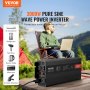 VEVOR pure sine wave inverter powering devices outdoors, featuring a 3000w power inverter and camping setup.