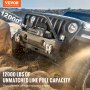 VEVOR truck winch pulling a jeep in tough off-road conditions, showcasing waterproof ip67 quality.