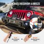 VEVOR truck winch mounted on rugged jeep with remote control and manual controller.