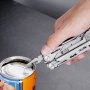 hand using VEVOR multitool pliers to open a can on a grey surface.