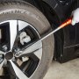 tightening a wheel bolt with VEVOR torque wrench set on a car tire with continental contact mc6 tire.
