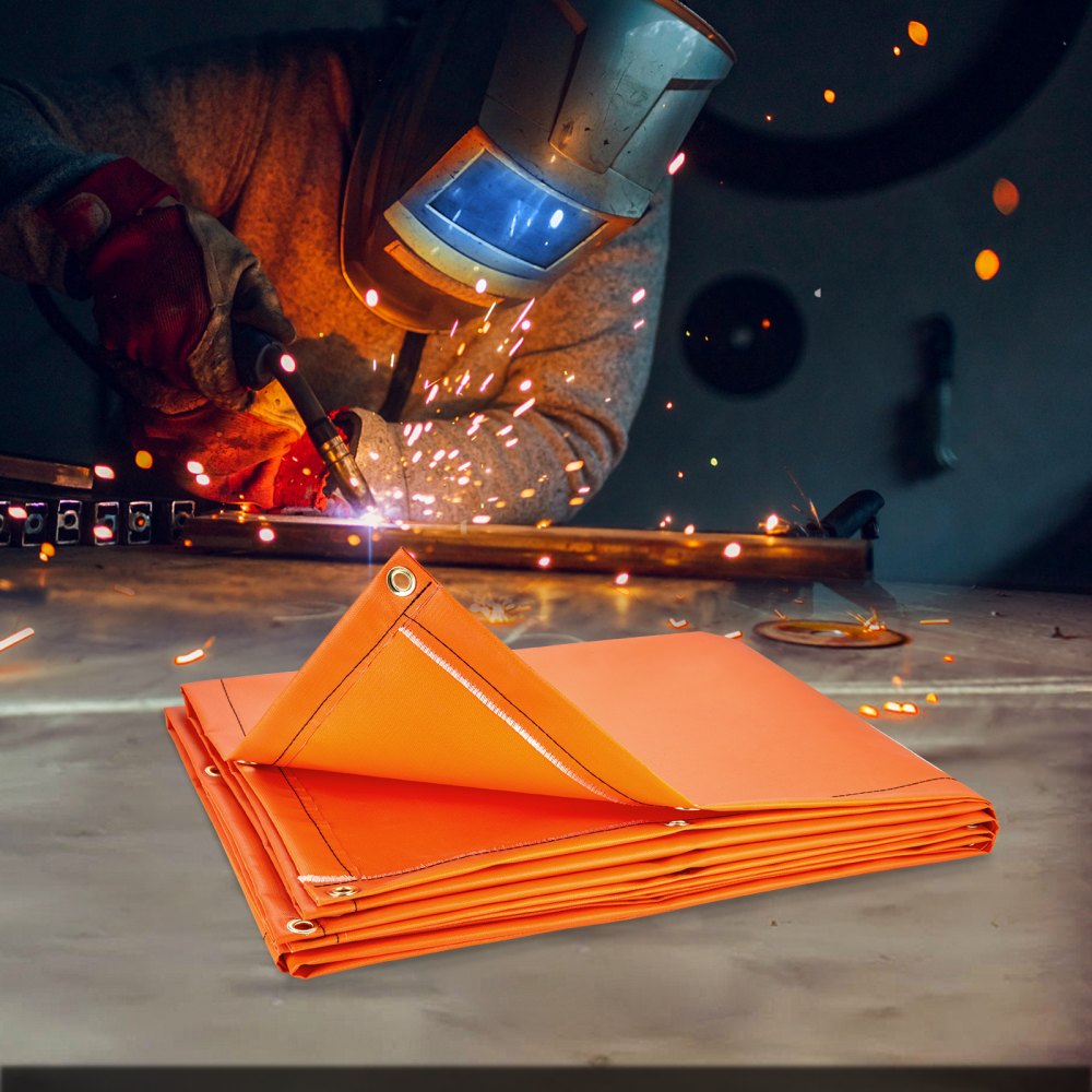 welder working with a VEVOR welding screen protecting from sparks and high heat in the background.