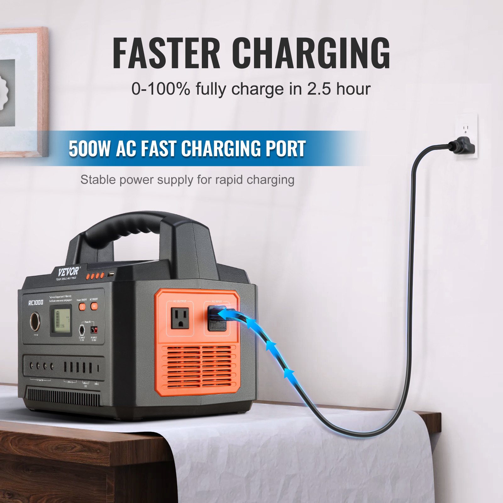 VEVOR portable power station with 500w ac charging port on table, plugged into wall socket.
