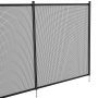 VEVOR pool fence with black metal posts and mesh panels for outdoor safety and privacy.