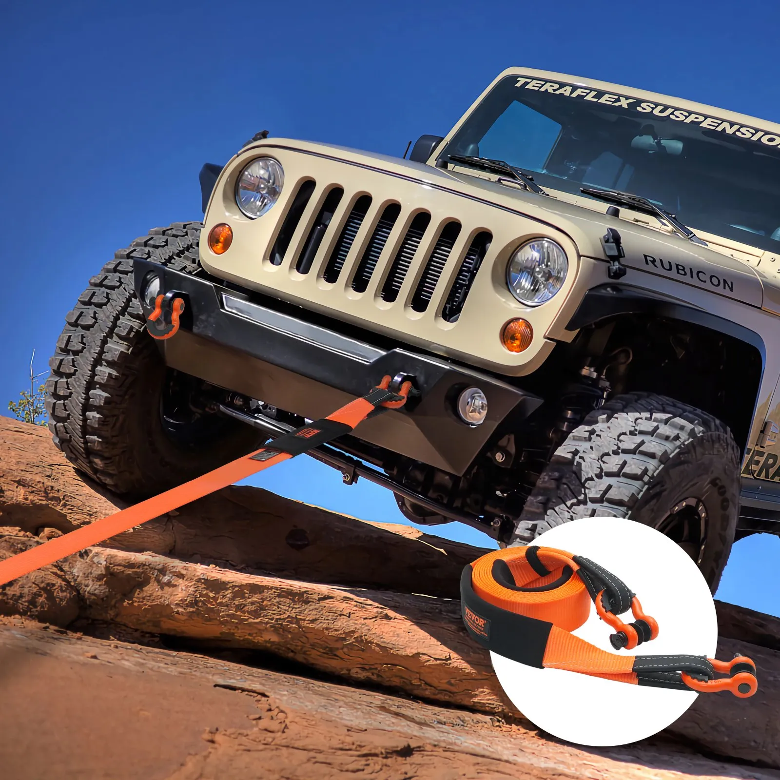 jeep being towed uphill using VEVOR heavy duty tow strap on rocky terrain under clear blue sky.