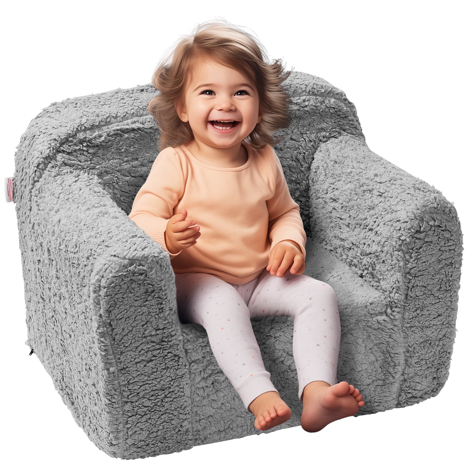 child sitting in a fluffy gray VEVOR kids armchair, wearing a peach shirt and white pants.