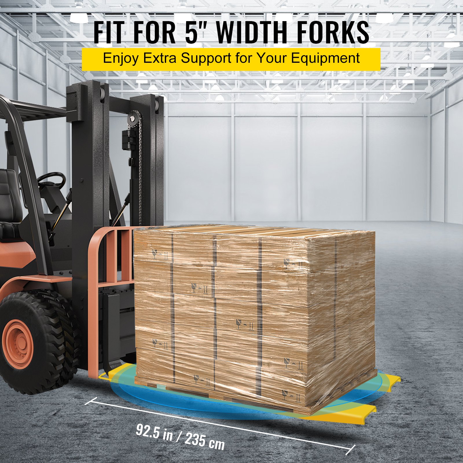 forklift with VEVOR pallet fork extension lifting a large wrapped wooden crate.