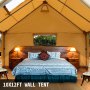 VEVOR canvas wall tent with interior setup, king-size bed, and bedside lamps.