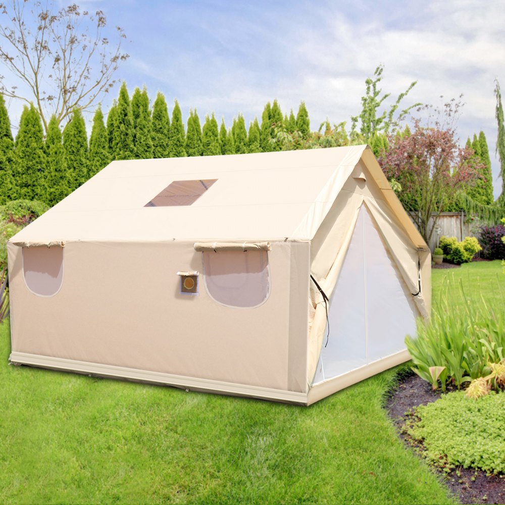 VEVOR canvas wall tent set up in a lush green backyard garden.