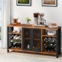 VEVOR industrial bar cabinet with wine storage, glass doors, coffee machine, and decorative items.
