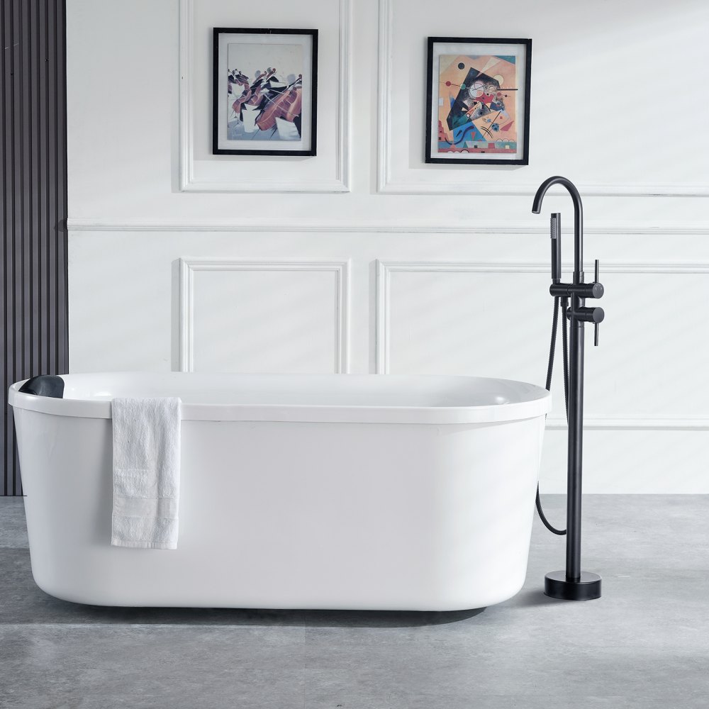 modern bathroom with a white free-standing bathtub, VEVOR freestanding bathtub faucet, and two framed artworks.