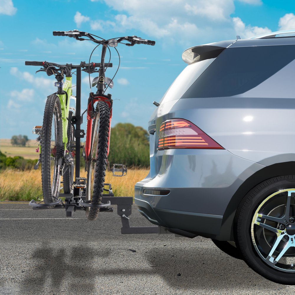 suv with two bikes mounted on a VEVOR hitch mount bike rack on a sunny day.