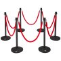 black VEVOR stanchion posts with red ropes arranged in a zigzag pattern.