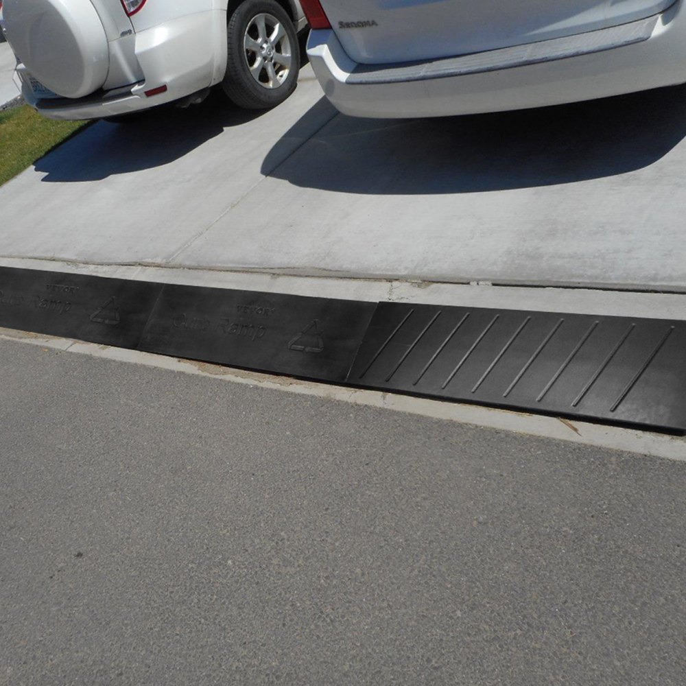VEVOR curb ramp installed on driveway for smooth vehicle access.