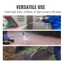 person using VEVOR pressure washer hose to clean a car, sidewalk, and garden wall. versatile use.