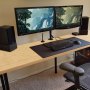 VEVOR bamboo table top with dual monitors, keyboard, and speakers in a modern home office setup.