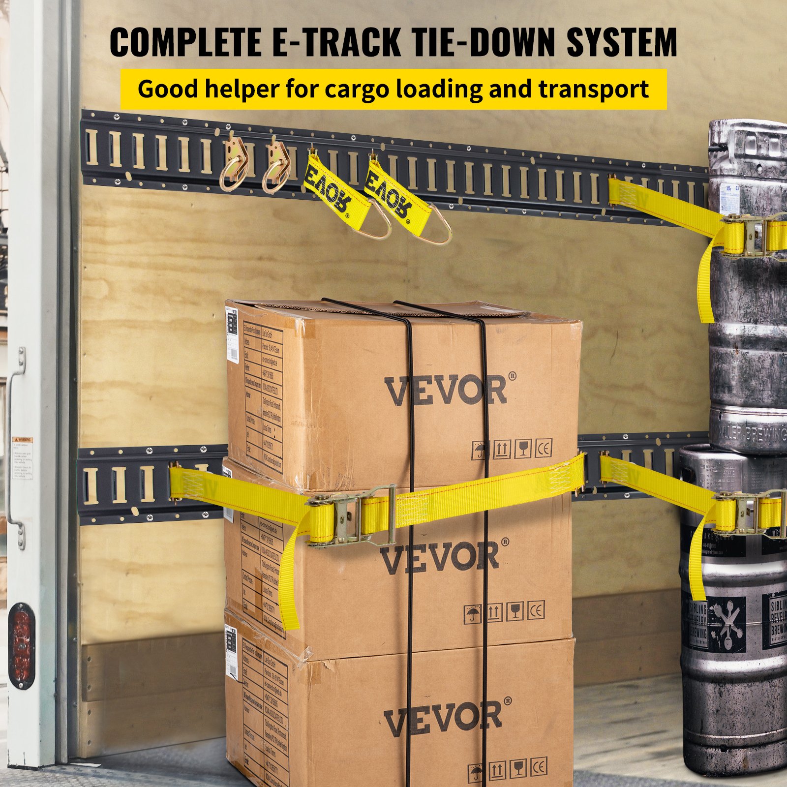 VEVOR e track tie-down rail kit securing boxes and barrels with yellow straps in a truck.