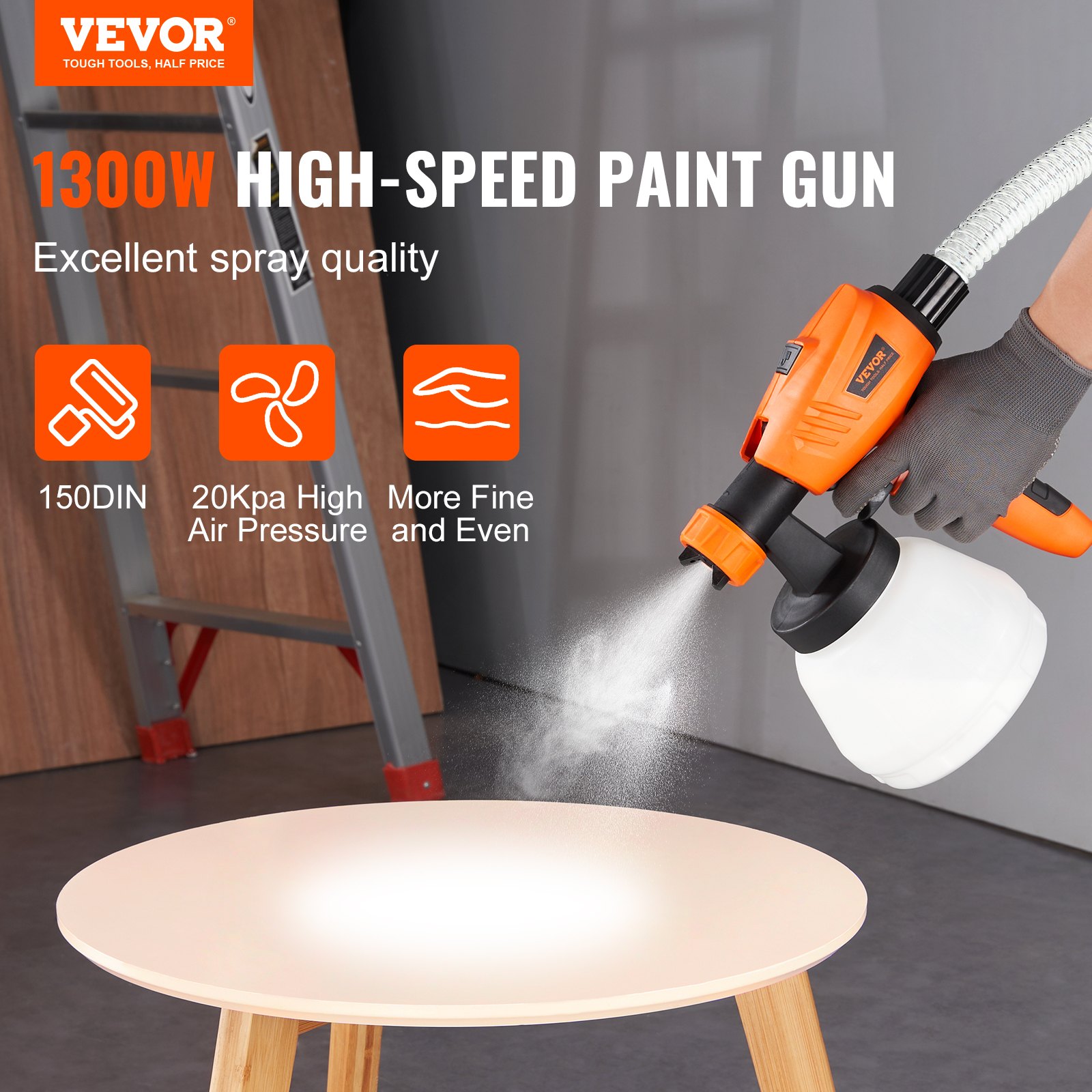 Pulverizador de pintura VEVOR con 1300 W de potencia, que demuestra una pulverización fina, uniforme y de alta velocidad sobre una mesa de madera.