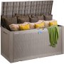 VEVOR deck box filled with decorative pillows and a green blanket draped over the edge.