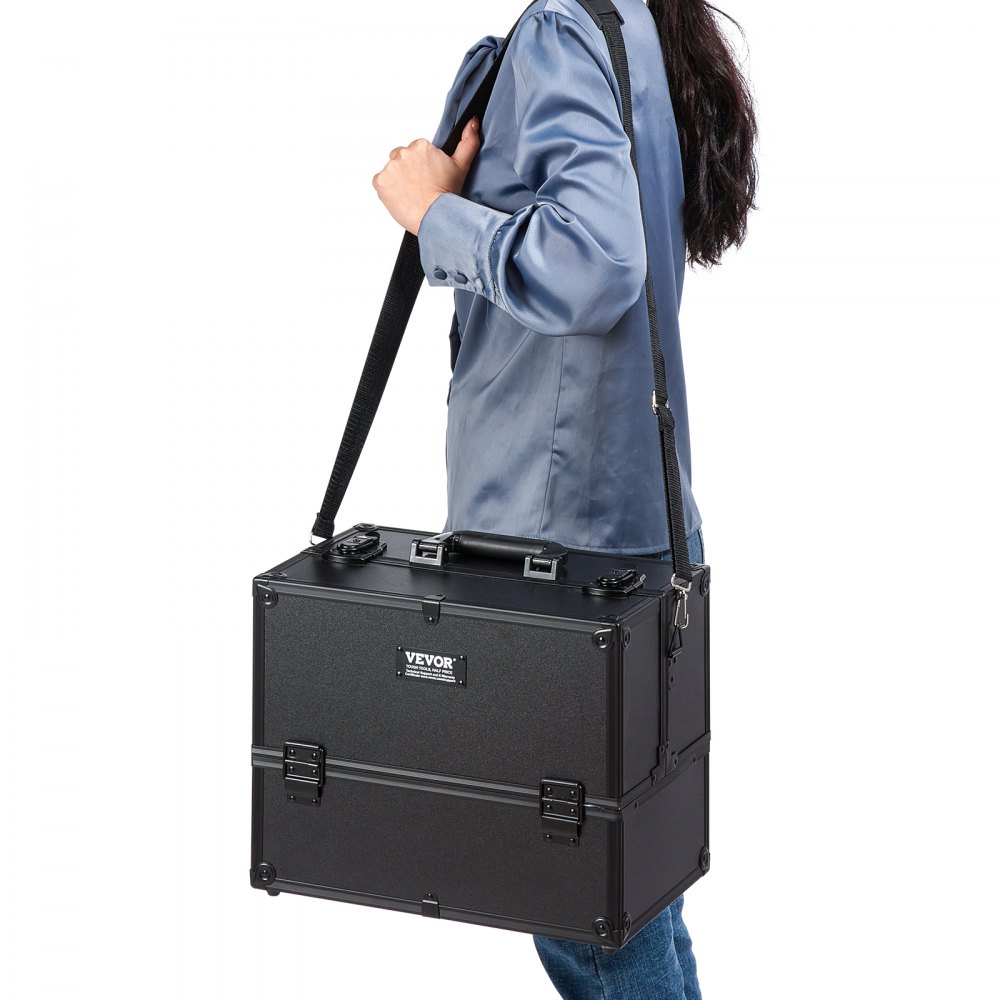 person carrying a VEVOR makeup train case with shoulder strap.